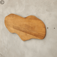 Tête de lit en manguier massif forme organique – courbes douces et finitions naturelles, bois massif clair travaillé à la main.